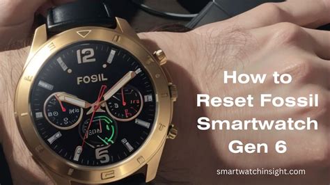 how to restart fossil smartwatch.